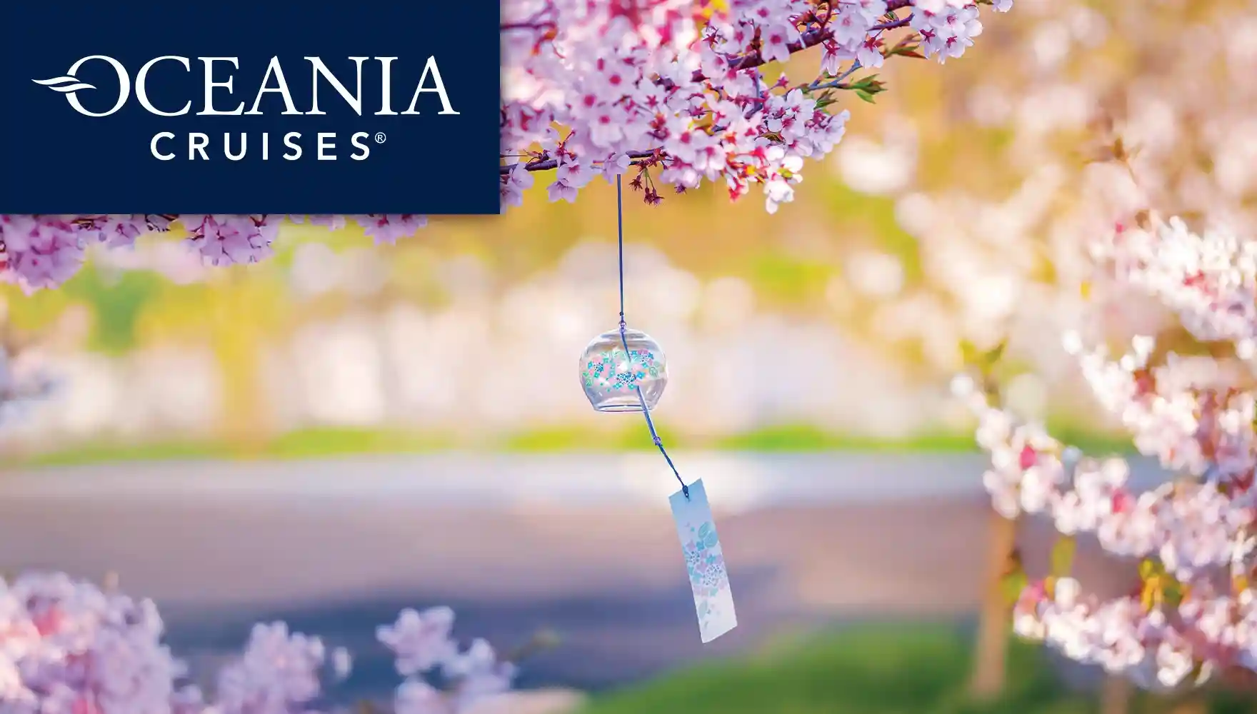 2027 Cherry Blossom Pathways Cruise, photo of a furin (Japanese wind chime) and cherry blossoms.