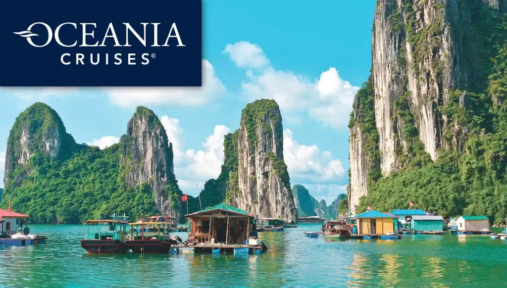 Photo of Ha Long Bay's limestone karsts and islets and local boat houses in Vietnam