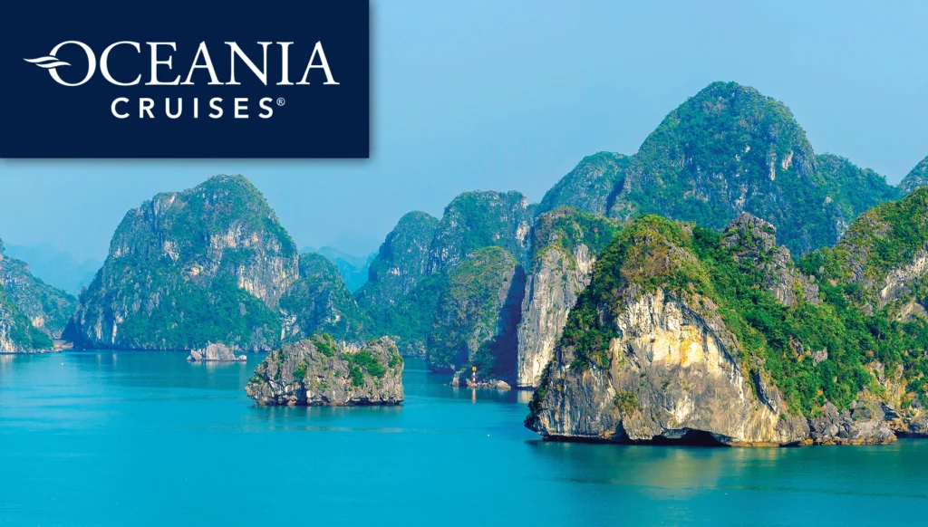 Photo of Ha Long Bay's limestone karsts and islets and local boat houses in Vietnam