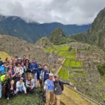 2025 Peru Splendors Tour group with Globus Tours at Machu Picchu.