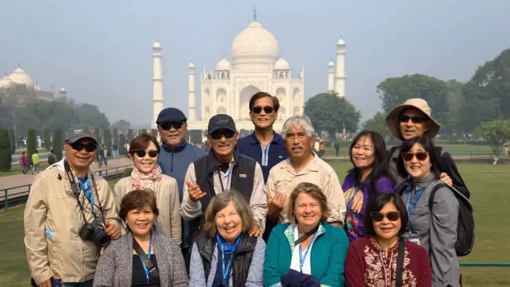 2026 Mysteries of India Tour Group in front of the Taj Mahal in India.