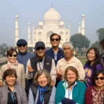 2026 Mysteries of India Tour Group in front of the Taj Mahal in India.