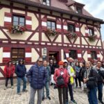2025 Heart of Europe Tour with Oktoberfest, photo of the group at Nuremberg Castle, Germany.
