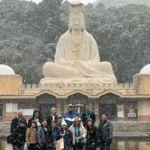 2026 Cherry Blossoms: Grand Okinawa, Kyoto, Nara, & Osaka Shopping Tour group at Fushimi Inari Shrine in Kyoto, Japan.