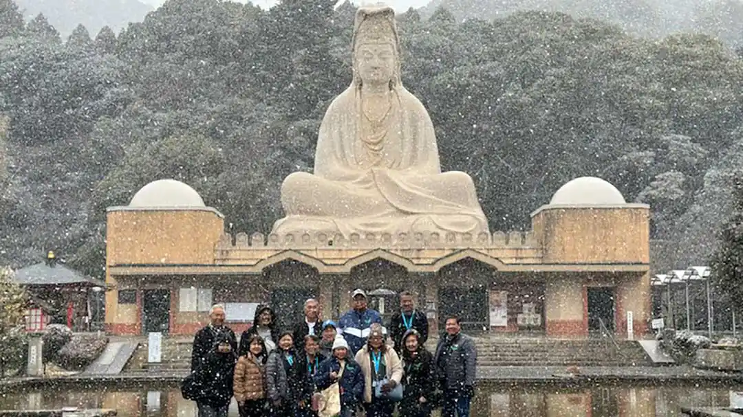 2026 Cherry Blossoms: Grand Okinawa, Kyoto, Nara, & Osaka Shopping Tour group at Fushimi Inari Shrine in Kyoto, Japan.
