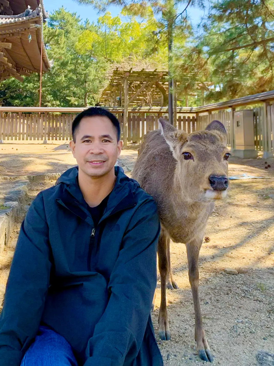 Cy with a deer at Nara Park, Japan